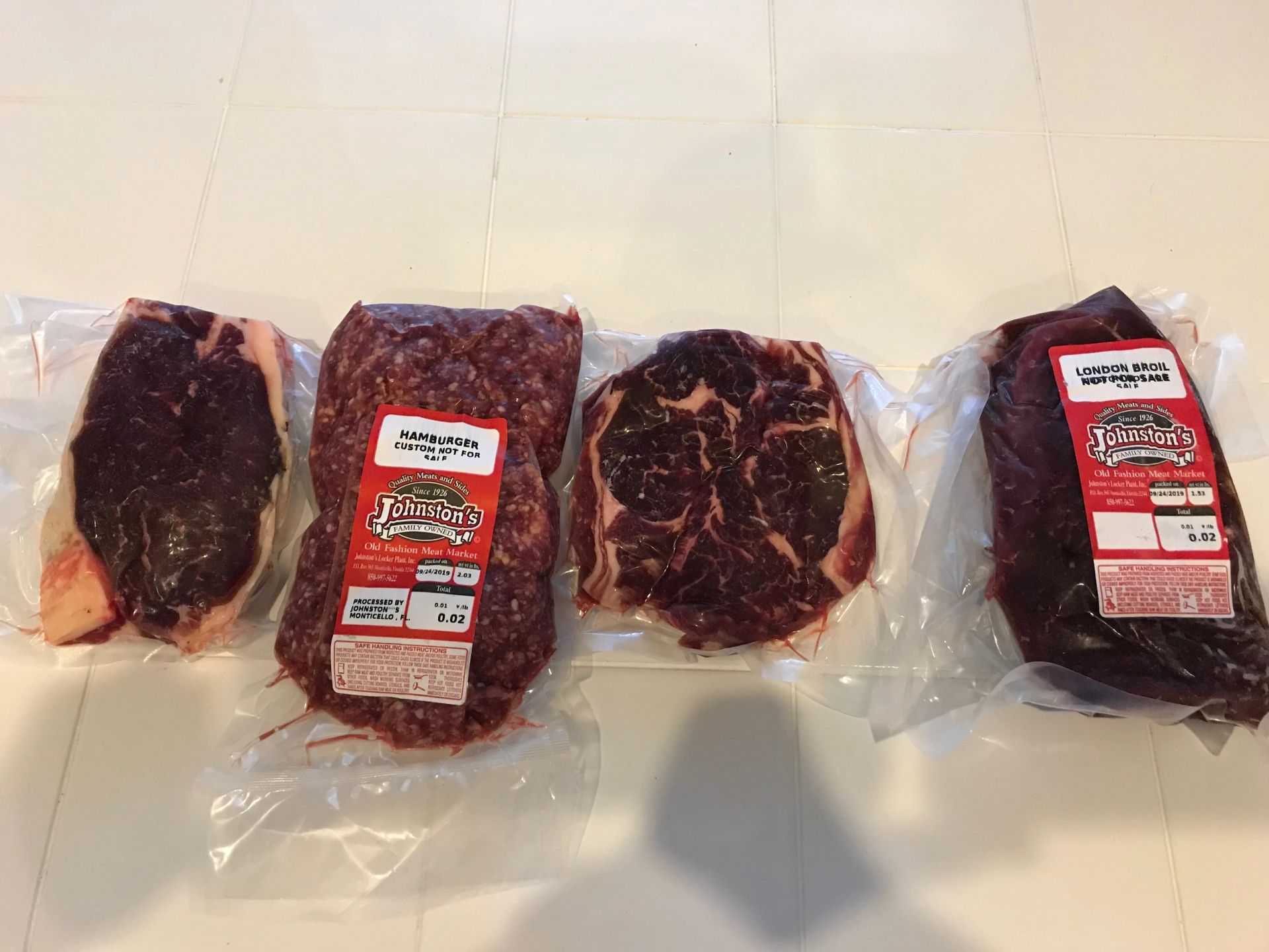 Individually vacuum sealed packages of beef.